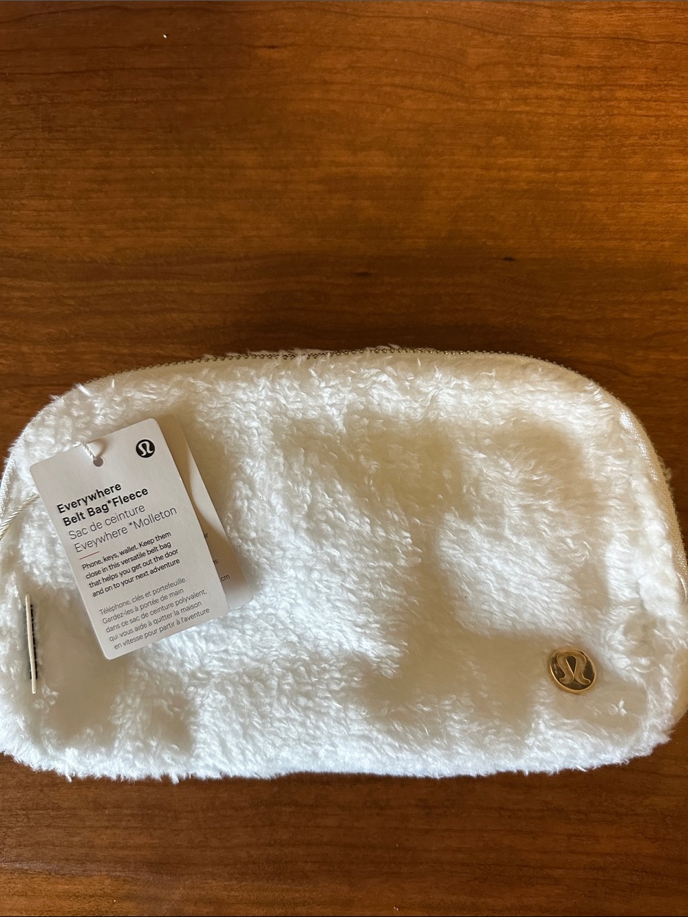 lululemon athletica Plush Fleece Everywhere Belt Bag in White with Gold Logo